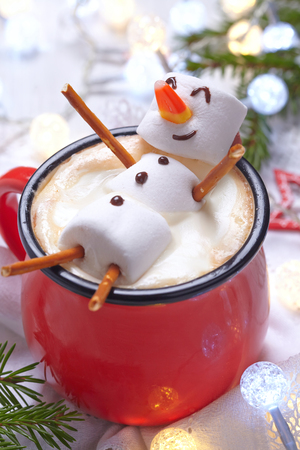 hot chocolate with melted marshmallow snowman