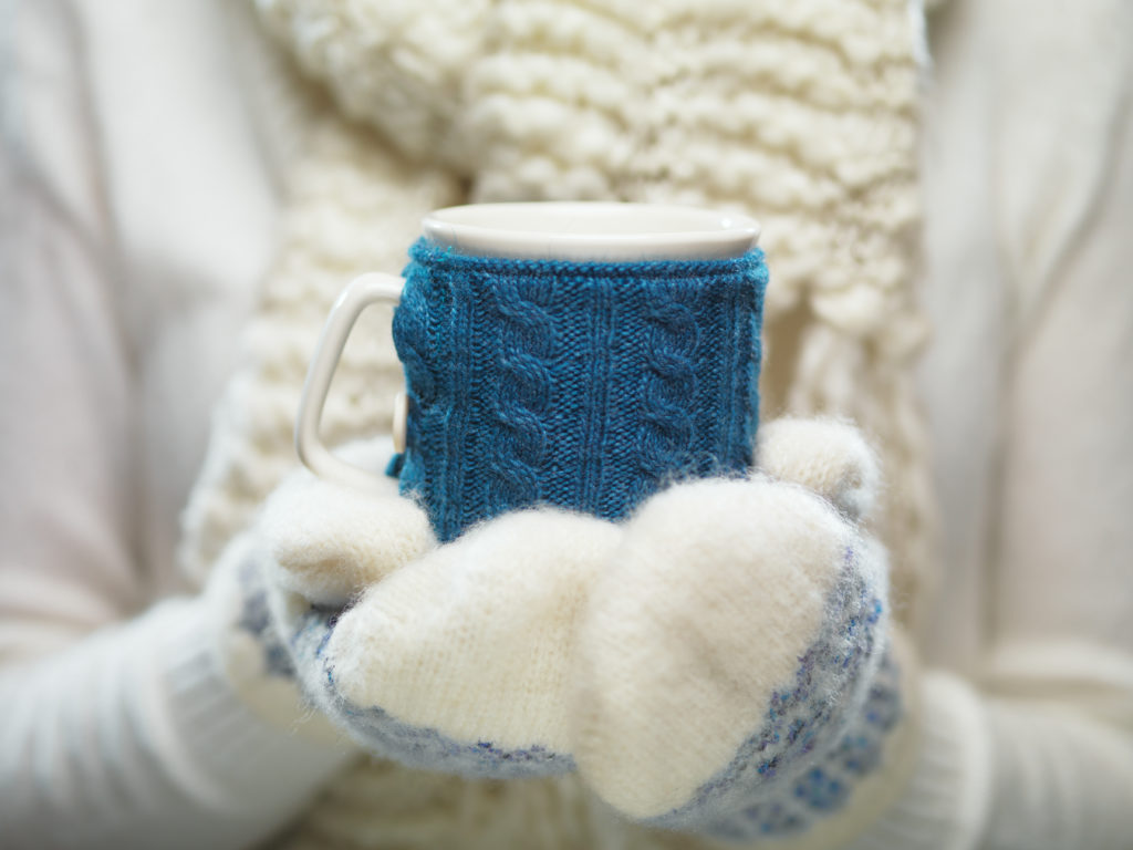 Woman holding Cozy Hot Chocolate