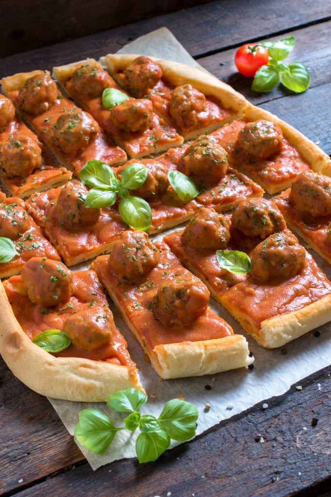 Served meatballs and tomato sauce in pastry