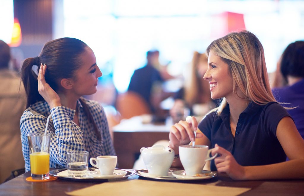 Friends enjoying cups of coffee