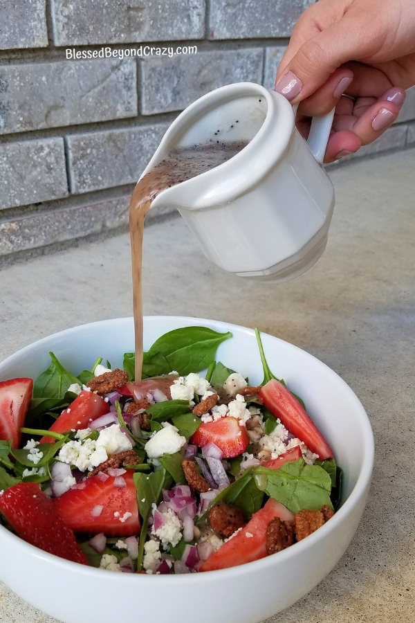 Pouring Pomegranate Vinaigrette Poppy Seed 