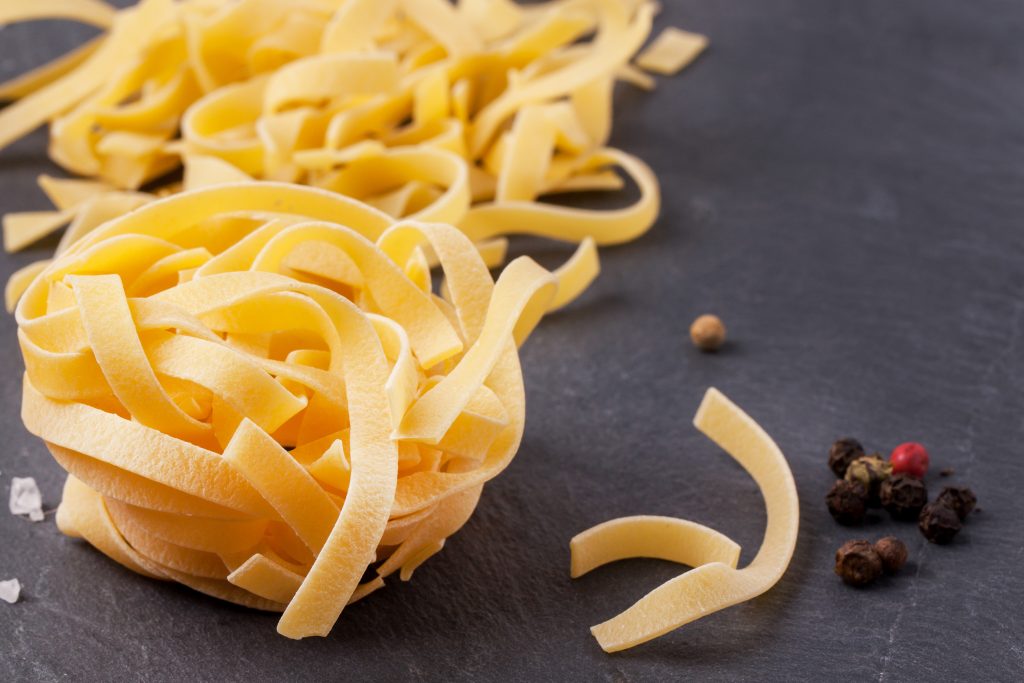 Close up of dry pasta for 16 minute shrimp pasta meal