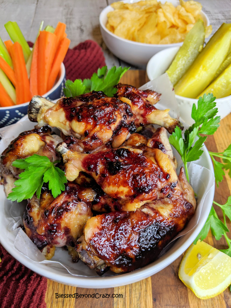 Bowl of delicious Baked Sticky Blackberry Chicken Wings