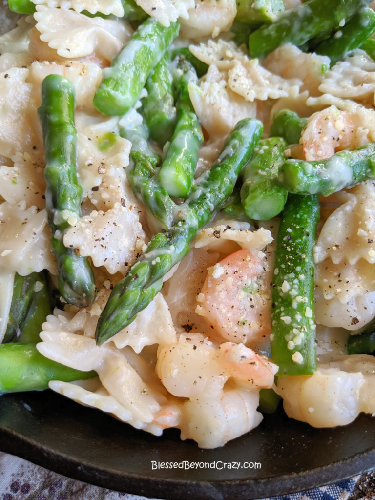 Close-up View of Ingredients for Creamy Asparagus Shrimp Pasta Skillet (Gluten-Free)