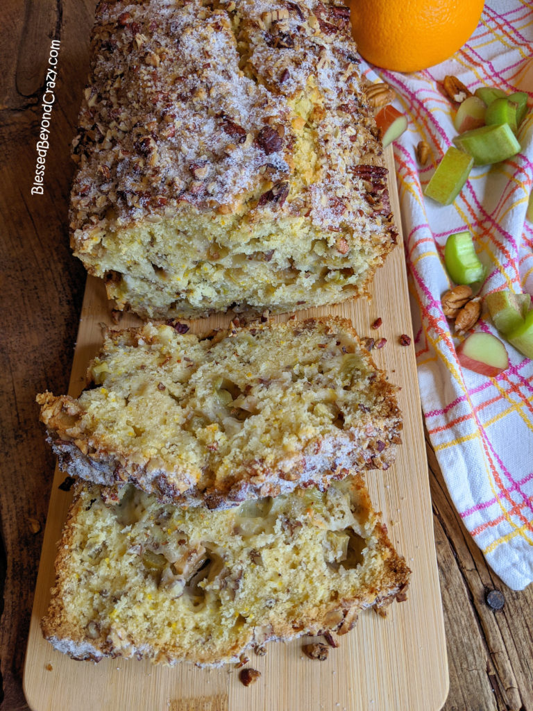 Ready to serve loaf of sliced Rhubarb Pecan Orange Zest Bread.