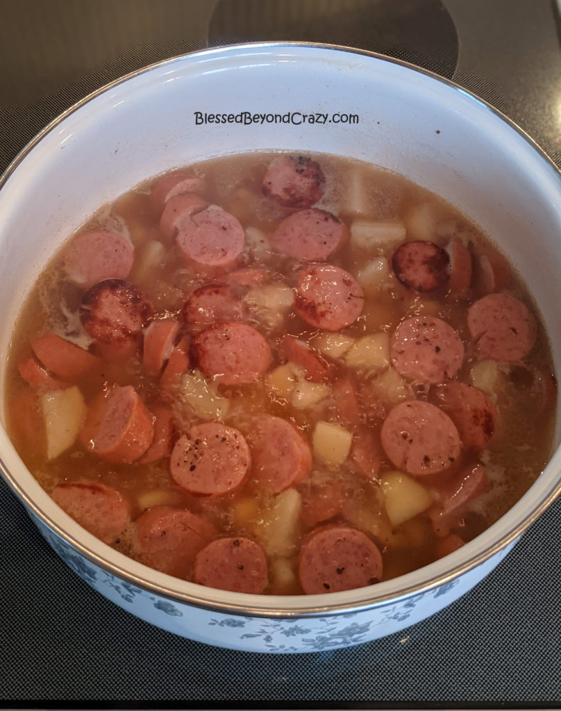 Cooking sausage and potatoes