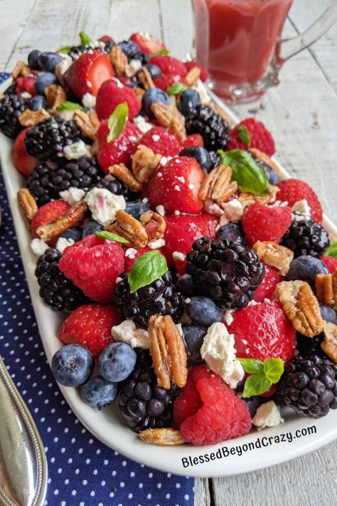 Platter of fresh mixed berry salad ready to serve.