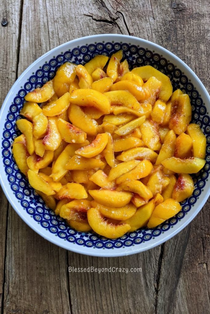 Fresh peaches placed in baking dish