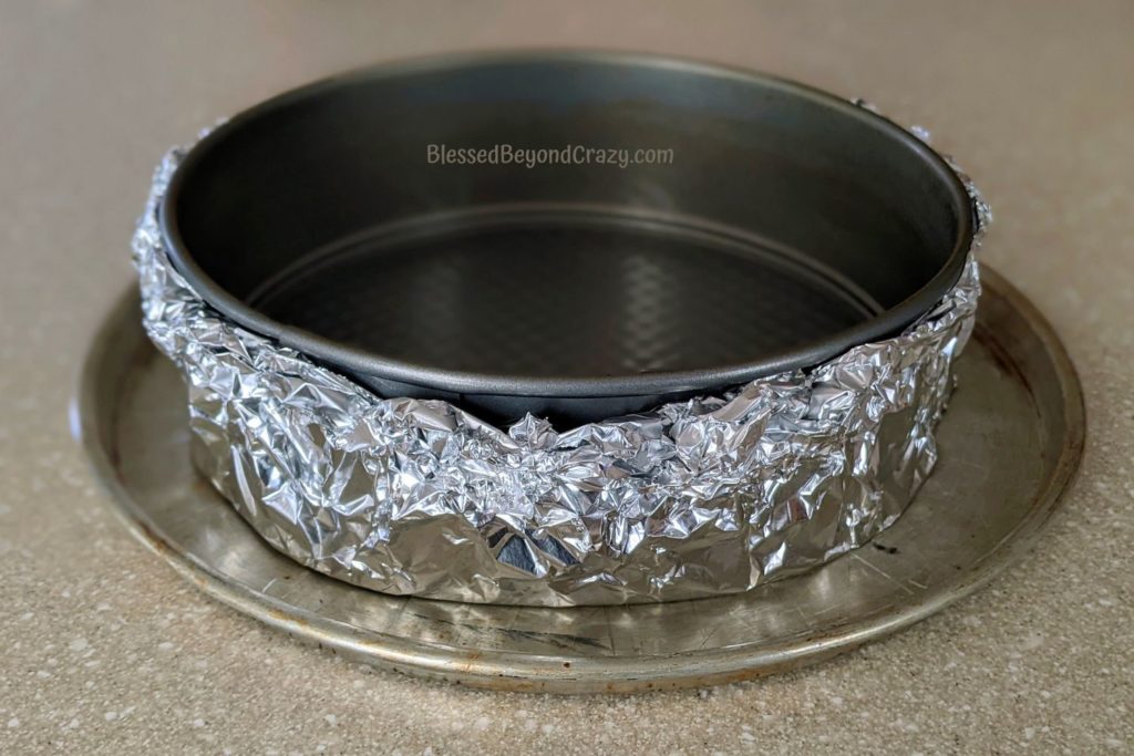 Aluminum foil wrapped around a springform pan