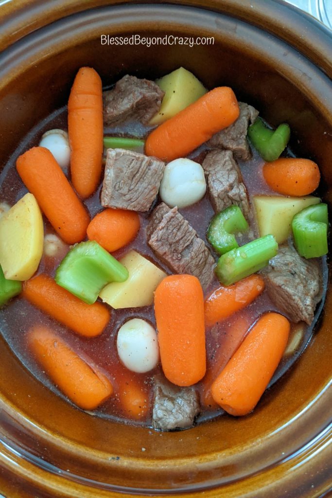 Savory Beef Stew in crockpot ready to cook