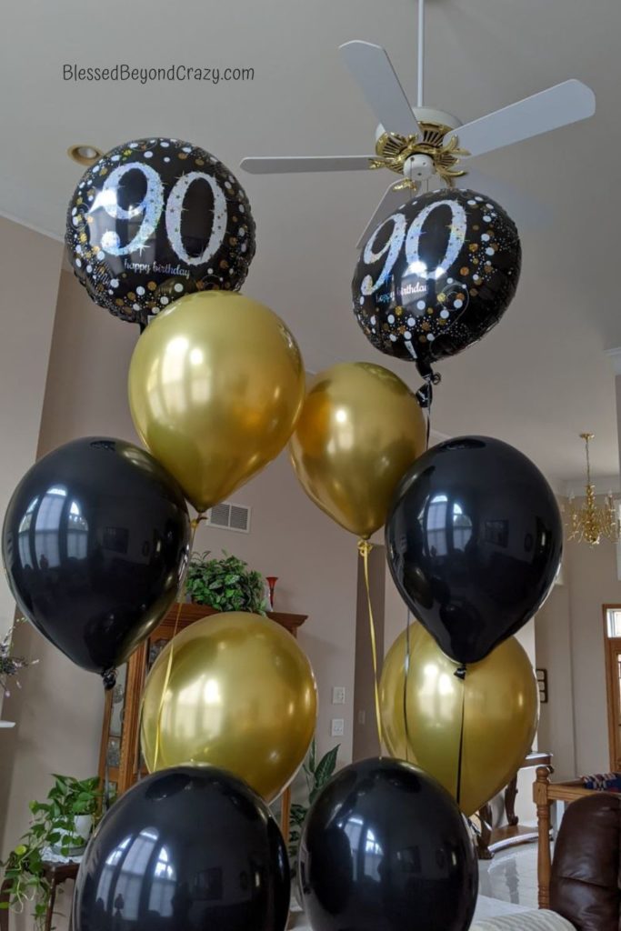 Helium balloons for 90th birthday party