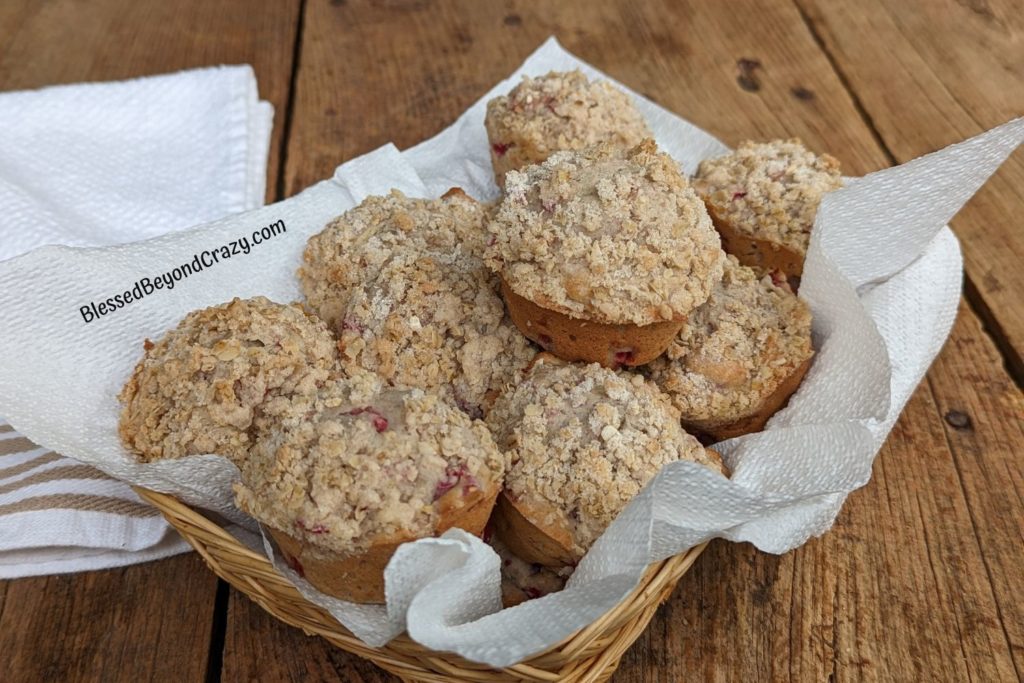 Raspberry Streusel Muffins cooling in a serving basket