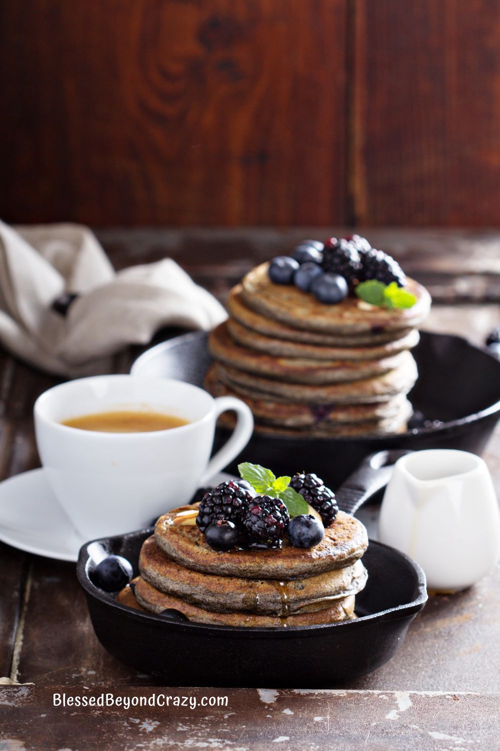 Ready to eat stacks of blueberry buckwheat pancakes.