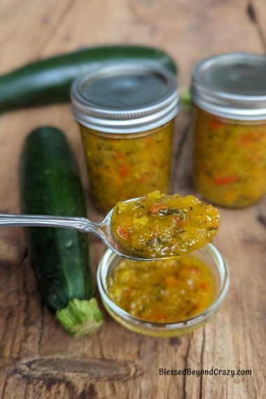 Spoonful of zucchini relish ready to eat.