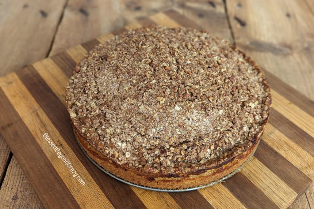 Butternut Squash Coffee Cake cooling on wooden board.