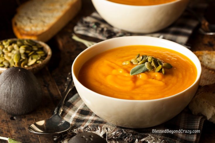 A close up photo of a blow of butternut squash soup.