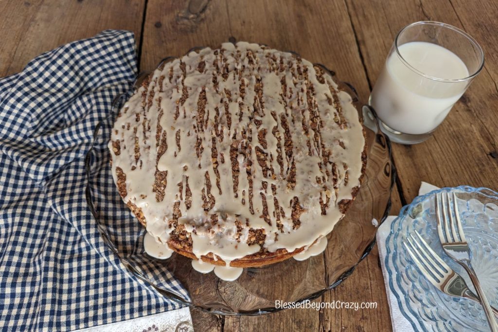 Overhead view of entire cake with icing drizzled on top.