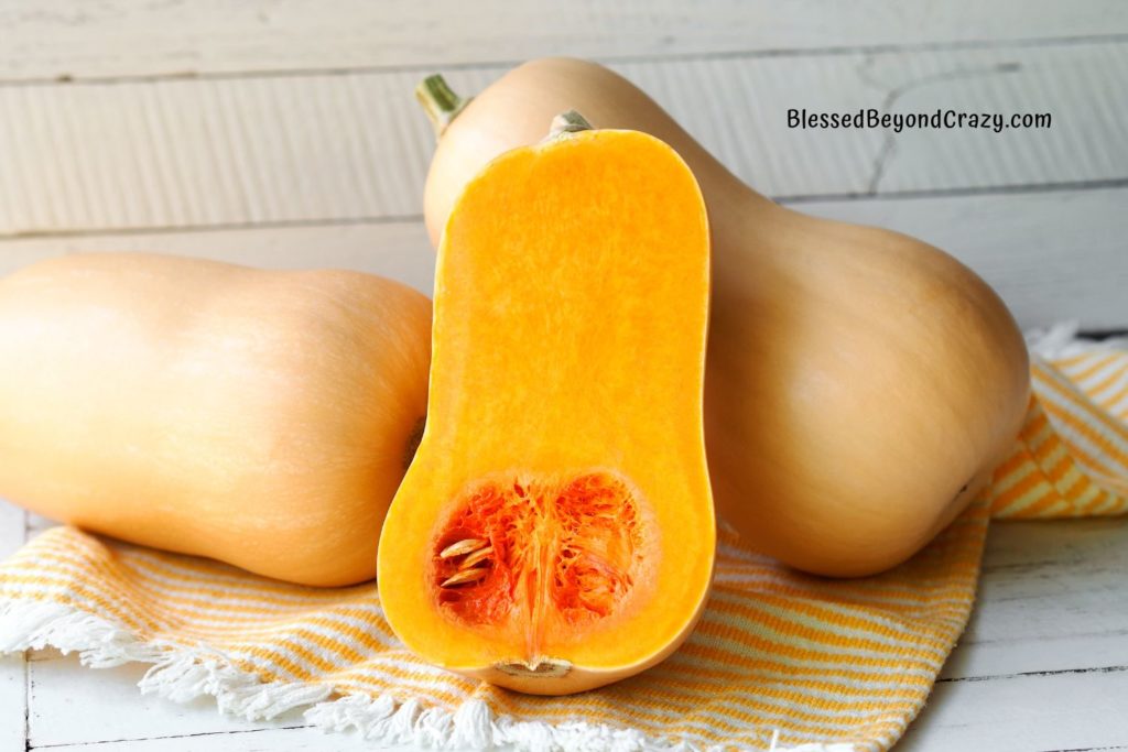 Two whole butternut squash and one cut in half.