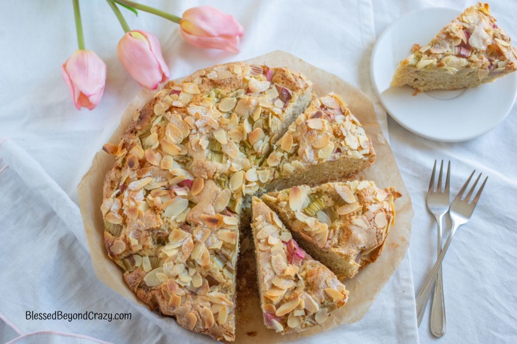 Overhead view of sliced. Rhubarb and Almond Coffee Cake