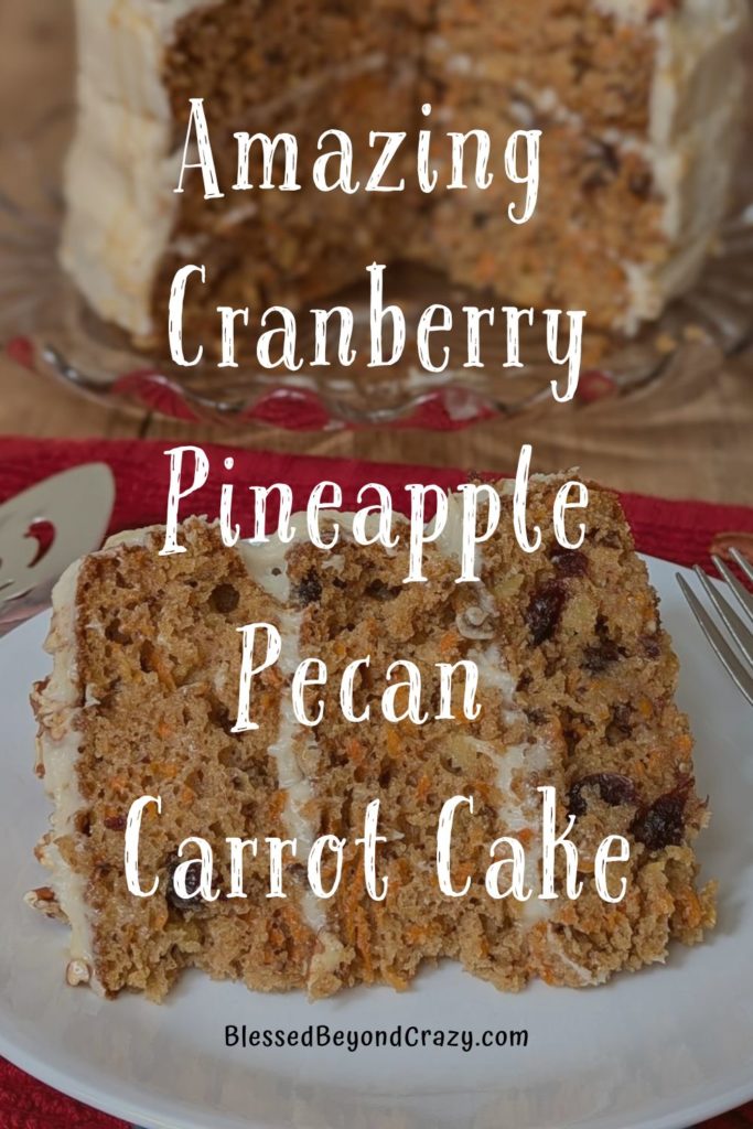 Pinterest image of slice of cranberry pineapple pecan carrot cake in foreground with remaining cake in background.