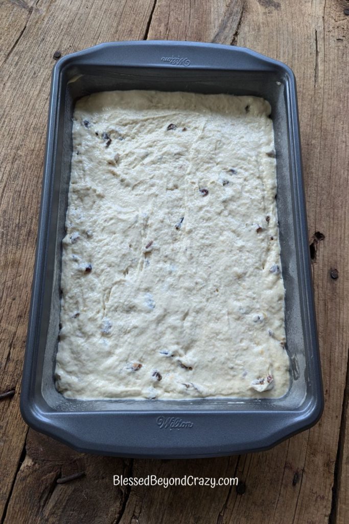 Coffee Cake batter in a 9 x 13 inch pan waiting for topping before baking.