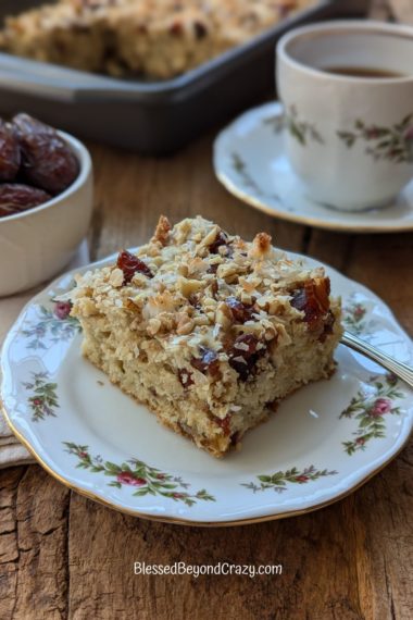 Close up photo of serving of coffee cake on pretty serving plate.