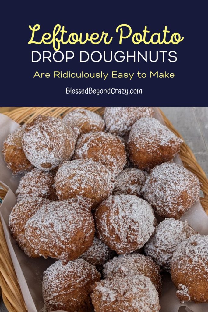 Pinterest image of Leftover Potato Drop Doughnuts sprinkled with powdered sugar in wicker basket.