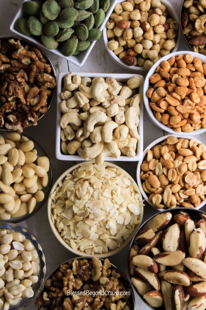 Overhead photo of bowls of various nuts.