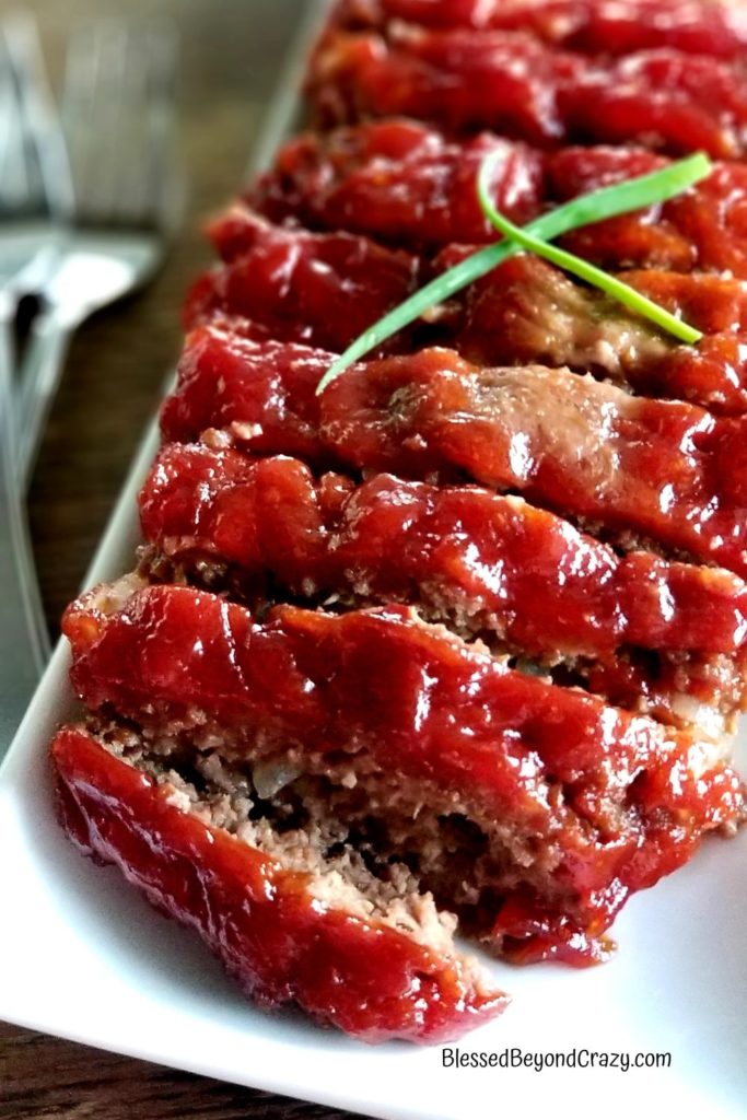 Platter of cut meatloaf.