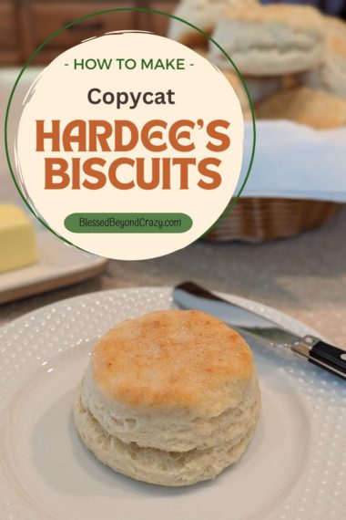 Pinterest image of individual biscuit with a basket of biscuits in background.